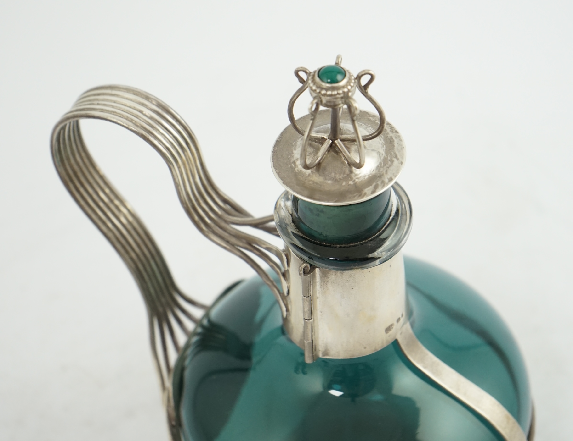 A Guild of Handicraft Ltd silver mounted decanter designed by Charles Robert Ashbee